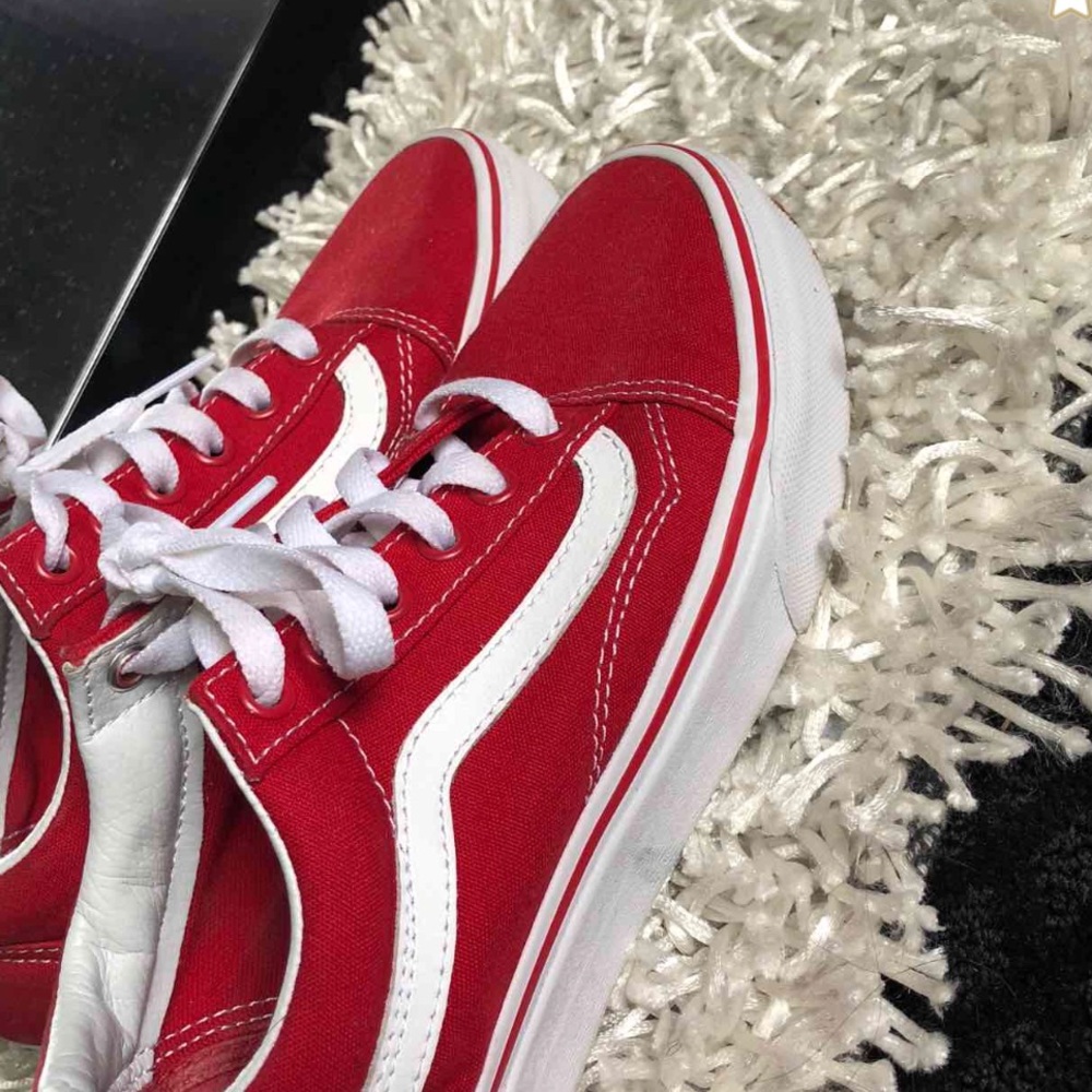 Red low top vans old skool